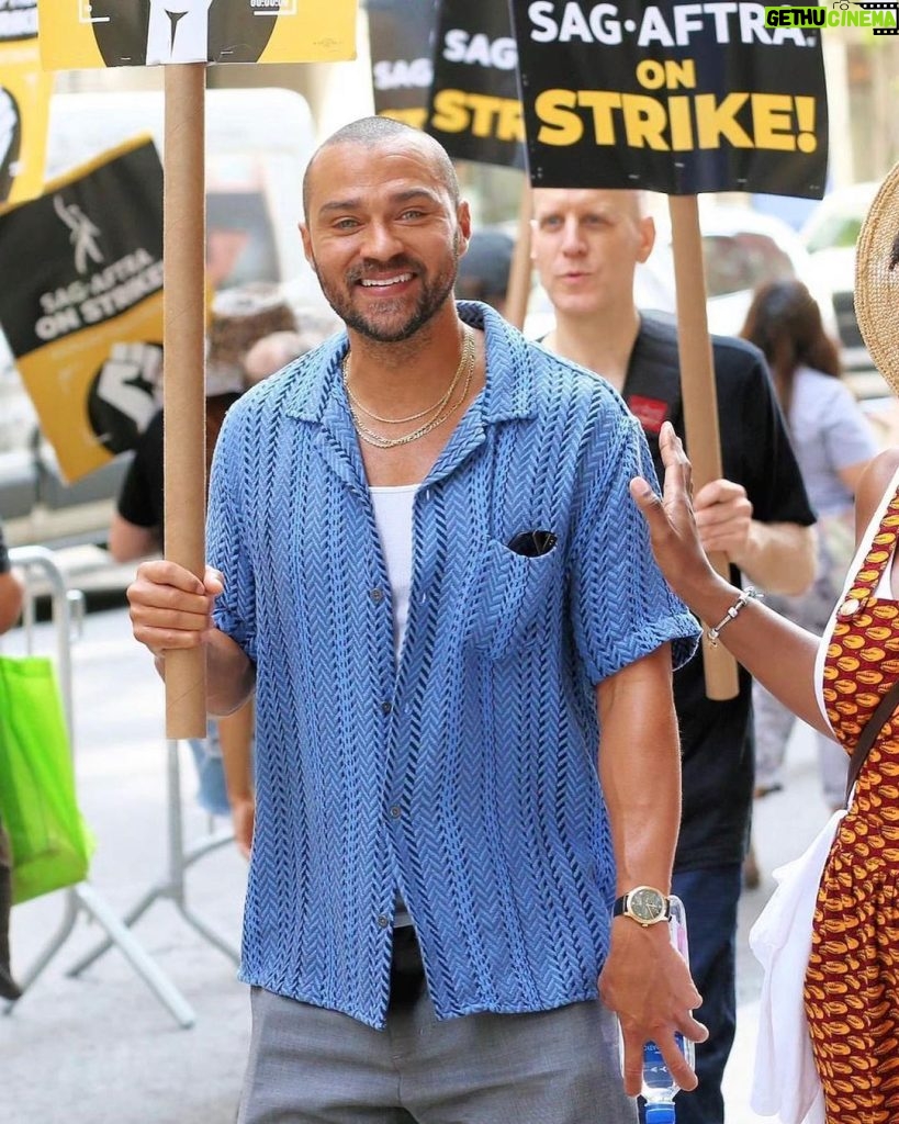 Jesse Williams Instagram - 💪🏽 Solidarity with labor, period. Workers united can halt operations in a multi-billion-dollar industry because they are necessary. If they are necessary, they have value. If they have value, they should have an unobstructed view of that value: transparency re: the fruits of their labor and the ability to negotiate fair compensation reflecting that value. Only 5-15% of our union members earn the annual $26,470 needed to qualify for health care. So 85-95% of us earn less than $26,470 a year. @Variety estimates that only 2 percent of the union’s membership “safely earn a middle class wage…” This is about the working class, not the wealthy. Hold fast and fairly. 🪧 @sagaftra 💪🏽 @wgawest @wgaeast