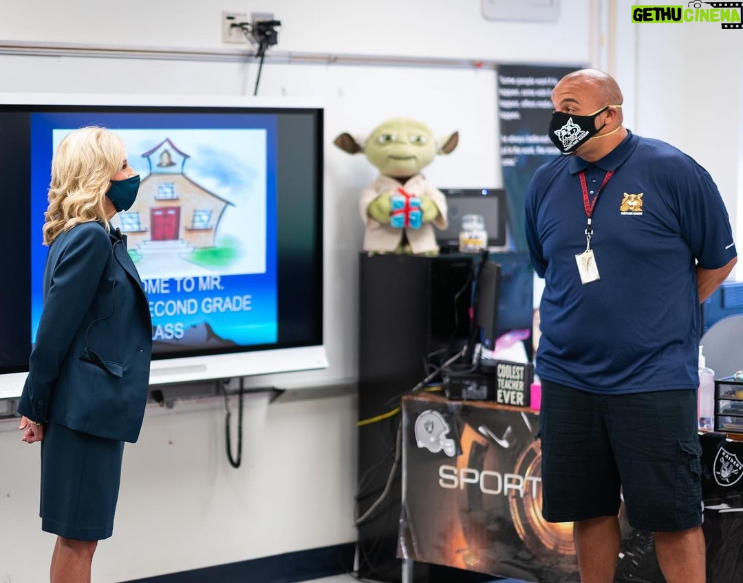 Jill Biden Instagram - We need a president who listens to educators. This is Mr. Christopher Wiggins. Let’s listen to him. He teaches 2nd grade at Shortlidge Academy in Wilmington, Delaware where I had the pleasure of visiting him on Tuesday. To support his students during this pandemic, Mr. Wiggins, like so many other educators, has made adjustments to his teaching plan in order to prepare for this school year. Educators everywhere are adapting to teaching remotely. Mr. Wiggins has decided to teach virtually from his classroom. He wants his students to get a sense for what their classroom will look and feel like once they're back. His priority is to build community and make his students feel safe. Teachers like Mr. Wiggins make me proud to be an educator. Shortlidge (Evan G.) Academy