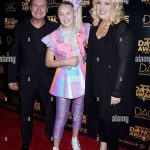 JoJo Siwa Instagram - What an incredible night at the 2023 Industry Dance Awards. 🩷 This event has meant so much to me for so many years (scroll and you’ll see what I mean…). I also am SO excited to officially announce… I get the incredible honor of joining the BOARD of Dancers Against Cancer, an incredible foundation I’ve been working with for the last decade of my life. DAC has helped so many dance families over the past years, including my own… I’ve been the family that’s donated and the family that was donated to by DAC and I can without a doubt say that this one of the best foundations I know. To be a board member means so much. I’m very grateful🩷 When DAC donated to my grandma just a few years ago I saw first hand how it changed her life. It doesn’t matter what the family affected needs the money for, might be treatment, might be groceries, might be a trip to Disneyland… DAC donates straight to the families affected by cancer and it’s so beautiful to see how it changes their lives. This is a new chapter of my life that I am so excited to dive deep in. 🩷 thank you Rick and the rest of the incredible DAC board for having me join your beautiful family, I promise to do you and DAC proud.🩷 for my entire life… I Am Dancer Against Cancer 🩷
