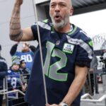Jo Koy Instagram - Throwing it back to @jokoy raising the @12s flag last Sunday. Who shall it be tonight? 🫡