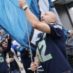 Jo Koy Instagram - Throwing it back to @jokoy raising the @12s flag last Sunday. Who shall it be tonight? 🫡