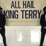 Joe Lo Truglio Instagram - 🚨BTS🚨”Cinco De Mayo” Heist, Season 6. This was a fun day and Terry was a living trophy. 🏆Not easy makeup to be in for ten hours, but golden attitude. I remember thinking how wonderfully outrageous this show is, as us weirdos pushed a shopping cart as fast as we could down the street Seinfeld used to shoot on. 🤯 #b99mems