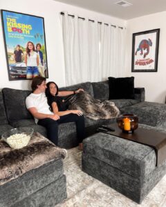 Joel Courtney Instagram - Who wants to come over for a movie night?! 🙋🏻‍♂️🍿 Thanks to @lovesac, the Courtney family now has the most epic entertainment couch. It has 6 hidden surround sound speakers, a subwoofer, and is comfortable enough to binge watch an entire tv show. My dream movie room has never been so perfect. So, what’re we watching? #lovesac #lovesacpartner #entertainmentroom #movieroomcouch