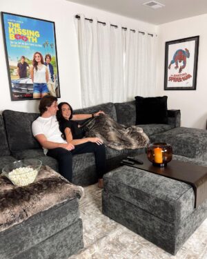 Joel Courtney Instagram - Who wants to come over for a movie night?! 🙋🏻‍♂️🍿
Thanks to @lovesac, the Courtney family now has the most epic entertainment couch. It has 6 hidden surround sound speakers, a subwoofer, and is comfortable enough to binge watch an entire tv show. My dream movie room has never been so perfect. So, what’re we watching?
#lovesac #lovesacpartner #entertainmentroom #movieroomcouch