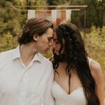 Joel Courtney Instagram - To think that it’s already been a year. I love you now more than I did 365 days ago ❤️ photography: @jsonivephotography rentals + styling: @mobohoevents hair: @braidsbyellie__ charcuterie: @eatneattreats mua: @makeupby_velvet dress: @grace_loves_lace Sedona, Arizona