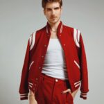 Joey Graceffa Instagram - about to be interviewed by Cesar Flickerman before competing in the Hunger Games. 😂 which red emoji is your favorite 🍒 . . @mood__magazine Photography: @ anthony__giovanni Styling: @edwin.j.ortega Grooming: @erosmua Interview: @willscitylife 👕@ysl The Capitol, Panem