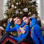 Joey Graceffa Instagram - This Christmas, we ARE the gift 🎄 The new @crystalwolf holiday collection collab with @misterpreda is HERE! 🌈 You can now shop the iconic hoodie and sweats that we shared when we first started dating! If you know, you know! Enjoy 20% sitewide and bundles of the new hoodie & sweats include a mystery box with 3 free items, shop while they last! Link in bio ❤️
