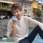Joey Graceffa Instagram - I only bought this gelato for the pic 😭🌈🍦🦄 comment only pink and blue emojis for a ❤️ Verona, Italy