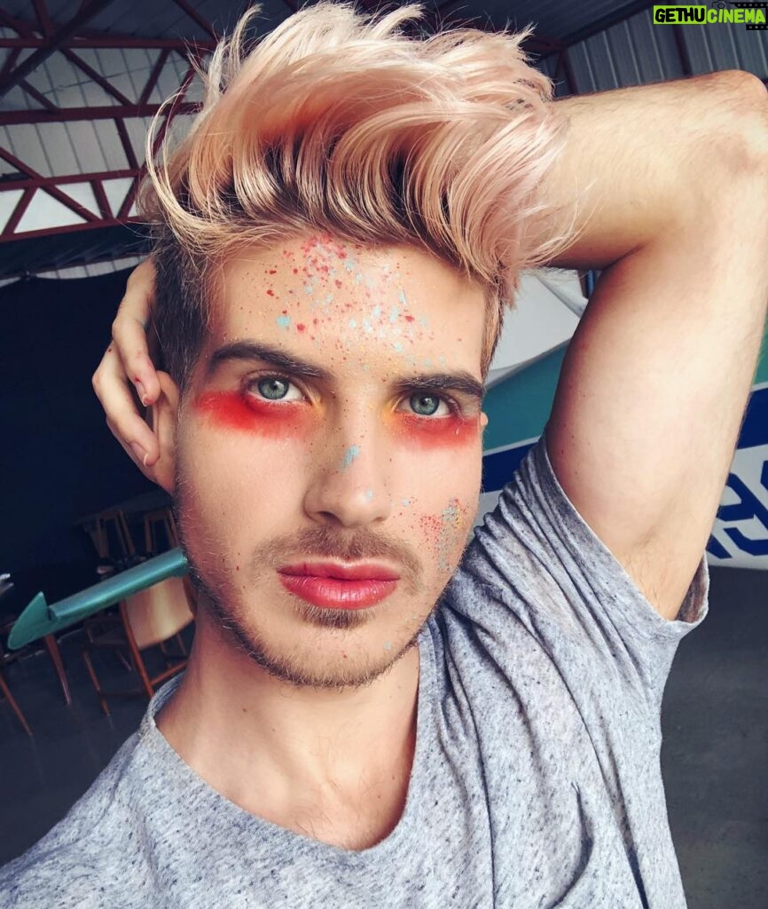 Joey Graceffa Instagram - Something on my face? 😉 Can’t believe my 4th book comes out in 2 days!! Who’s excited for the conclusion to the EDEN series?! Attend the livestream on Tuesday and PRE-ORDER A SIGNED COPY, link in bio! #RebelsOfEden 🌺