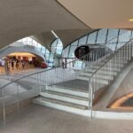 John Barrowman Instagram - It’s Throwback Saturday and we’re flying TWA! This is the Eero Saarinnen TWA terminal at JFK - Now converted to a fabulous retro hotel. @scottmale #lgbtqia #jfk #retro #airline #twa Sayville Ferry Service