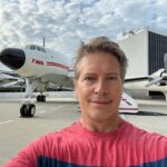 John Barrowman Instagram - It’s Throwback Saturday and we’re flying TWA! This is the Eero Saarinnen TWA terminal at JFK - Now converted to a fabulous retro hotel. @scottmale #lgbtqia #jfk #retro #airline #twa Sayville Ferry Service