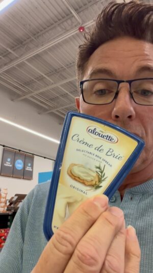 John Barrowman Instagram - Get down to Aldi for this great deal. Alouette Crème de Brie is worth the trip and would be part of a delicious Superbowl snack. I can’t believe the price! Half of what it costs in other supermarkets. Dont be a supermarket snob shop Aldi #notanad 
@aldiusa 
#aldifinds #aldi #fyp #foryou #cheeselover #trendingvideos #johnbarrowman #trendingreels #lgbtq #fanfamily #friends #superbowl #food #snacks