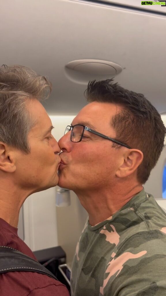John Barrowman Instagram - It worked… the face at the beginning though and “Are we meant to be here?” The surprise worked. @british_airways we are looking forward to our evening of luxury. Great pjs btw. @scottmale #lgbtq #love #flying #firstclass #surprise #comfort #husband #champagne #Airbus #a380 Heathrow Airport