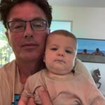 John Barrowman Instagram - Meet Frank and my bed head. #uncle #trendingreels #live #lgbtqia #family #love #baby #trending Palm Springs, California
