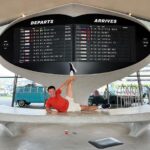 John Barrowman Instagram - It’s Throwback Saturday and we’re flying TWA! This is the Eero Saarinnen TWA terminal at JFK - Now converted to a fabulous retro hotel. @scottmale #lgbtqia #jfk #retro #airline #twa Sayville Ferry Service