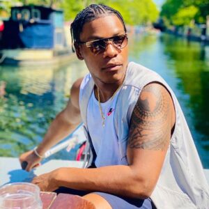 John Boyega Instagram - Sunny London is the BEST!!! Melanin has increased by 25%! Elbows and knees fully moisturized! Activated!