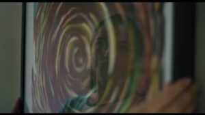 John Green Instagram - Yesterday I got to show you the first stills from the Turtles all the Way Down movie coming this spring to @streamonmax Today, I get to show you what Aza is looking at. Thanks to @raymond_pettibon_ for allowing us to use his painting in our movie.