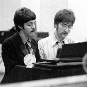 John Lennon Instagram - A DAY IN THE LIFE. 🔵
It was a good piece of work between Paul and I. I had the 'I read the news today' – all that bit. And it turned him on, you know. Because now and then we really turn each other on with a bit of a song. 

It just sort of happened beautifully. And we arranged it and rehearsed it – which we don’t often do – the afternoon before, so we all knew what we were playing. And we just all got into it. And it was a real groove, you know, the whole scene, on that one.

It had two stories. One was (Tara Brown) the Guinness child that killed himself in a car. That was the main headline story. And on the next page there were about four thousand holes in Blackburn, Lancashire.

It was (written) in Kenwood, the house in the suburbs. I'm on the piano and the TV is going, over in the corner, flickering. And I was just looking for inspiration and I looked down. Do you know those kinds of sections they have in newspapers of top different things that happened? They had about four thousand holes in Blackburn, Lancashire – a real story that the council had spent real money.

The bulk of the song was written entirely by me. Paul's contribution being that little beautiful little lick going into his song, 'I'd love to turn you on' – that melodic little piece there where it changes – is his contribution. 

It came to a where I needed a middle eight, but, you know, that would have been forcing it. All the rest had come out smooth, flowing, no trouble. And to write a middle eight would have been to write a middle eight. 

We got into 'how about putting a whole different song' which he already had – that had nothing to do with 'A Day in the Life' – which is all about being on the top of the bus in a barber chair. He sang that (middle) bit. He had that one little lick floating around in his head. He couldn't use it for anything. He stuck it on. 

And putting those two together was a pre­cursor to the Abbey Road (medley) style, later on.