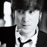 John Lennon Instagram – What’s your favourite song from the early Beatles ‘black and white’ era?

Photos: John Lennon making faces to Max Scheler in a break from filming ‘A Hard Days Night’ on a train between London Paddington and Minehead, UK, March 1964