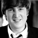 John Lennon Instagram – What’s your favourite song from the early Beatles ‘black and white’ era?

Photos: John Lennon making faces to Max Scheler in a break from filming ‘A Hard Days Night’ on a train between London Paddington and Minehead, UK, March 1964