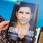 John Stamos Instagram - 🌺 #IfYouWouldHaveToldMe by @johnstamos is just over a month away from landing in bookstores! This "heartfelt, sincere memoir filled with useful wisdom" (@kirkus_reviews) is a poignant, universal story about friendship, love, loss, and the courage to embrace love once more. Preorder now and enter for a chance to win a magical prize (details at the link in bio). We can hardly wait! ✨ If you could tell your younger self anything, what would you say? ⬇️