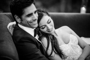 John Stamos Instagram - Marriage is balancing two worlds on the tip of a promise, a lesson in compromise, a testament to trust. It’s a partnership of mutual respect, shared adventures and collective dreams.  Happy anniversary, @caitlinskybound All my heart, Forever.  XOJS