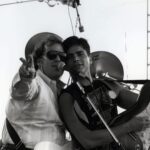 John Stamos Instagram - Today, I lost more than a friend; I lost a part of my soul, my history - Jeffrey Foskett, my dearest friend, brother, and the brightest light in my life, has left this world.  This morning, when I got the news, uncontrollable tears streamed down my face, a physical manifestation of the heartache within.  My son Billy heard my cries, joined my wife in holding me up, and then ran off, only to return with a small, tender offering – a drawing. His innocent hands sketched a picture of Jeff with hearts ascending to heaven, with me, waving goodbye. A stairway of hearts, and next to the top heart, he wrote God. A simple yet powerful symbol of love and loss that pierced through my grief. Jeff was more than just a friend; he was the one who brought the harmonies of The Beach Boys into my life, and with them, a spectrum of color and joy I never dreamed would be part of my life.  He was a vibrant force, a radiant soul whose laughter and wisdom touched everyone he met. He was an older brother in spirit, guiding, lifting, and loving me, sometimes more than I thought I deserved. Jeff taught me that love is a beautiful and necessary part of our lives, but it comes with a cost—the unbearable pain of loss. It's the kind of pain that can make us question whether we should ever allow ourselves to love so deeply, so completely. Should we keep our walls up and shield our hearts from the world in an attempt to avoid the sharp, immense sorrow that follows when we say goodbye to someone we hold dear? But then, as I reflect on Jeff's remarkable life and the profound impact he had on mine, I realize that this pain is the price we pay for the privilege of knowing and loving someone like him. Yes, the pain is excruciating and cuts deep into our souls, but it is a testament to the depth of our connection. Yet, when I think of the 40 years we shared – the uproarious laughter, the music that we believed changed lives, and the unshakable bond of brotherhood – I can't help but feel grateful. Grateful for every moment, every note, every piece of wisdom he shared with me. CONT.