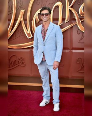 John Stamos Instagram - We got the golden ticket to the premiere of @wonkamovie last night! It was such a treat to bring Billy with us to this one. He was so excited and we all loved the movie. Thanks for having us! Go see #WonkaMovie this weekend 🍫 

@johnphotography
@gilbertfloresphoto
@gettyentertainment