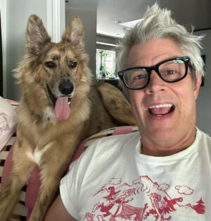 Johnny Knoxville Instagram - I can’t stop taking pictures of me and @bucket.biz. I’m a smidge under the weather so me and her have been curled up on the couch for a few days. I actually have a crick in the back of my neck because she sits on it like a cat. But she’s so cute I can’t tell her to get down. ❤️ Well that’s not entirely true as she has tooted on my shoulder a couple of times(see pic) and we do re-situate in those instances. 🙊