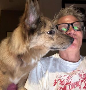 Johnny Knoxville Instagram - I can’t stop taking pictures of me and @bucket.biz. I’m a smidge under the weather so me and her have been curled up on the couch for a few days. I actually have a crick in the back of my neck because she sits on it like a cat. But she’s so cute I can’t tell her to get down. ❤️ Well that’s not entirely true as she has tooted on my shoulder a couple of times(see pic) and we do re-situate in those instances. 🙊