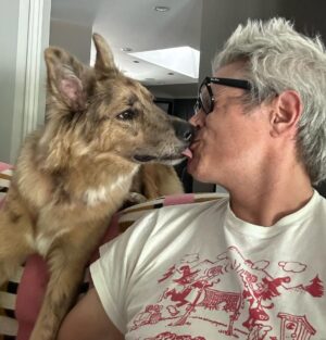 Johnny Knoxville Instagram - I can’t stop taking pictures of me and @bucket.biz. I’m a smidge under the weather so me and her have been curled up on the couch for a few days. I actually have a crick in the back of my neck because she sits on it like a cat. But she’s so cute I can’t tell her to get down. ❤️ Well that’s not entirely true as she has tooted on my shoulder a couple of times(see pic) and we do re-situate in those instances. 🙊