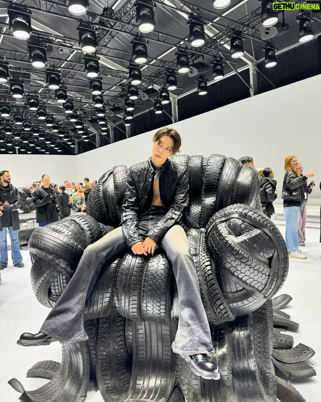 Johnny Suh Instagram - big black chair @acnestudios