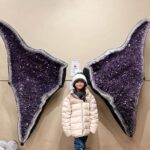 Jolina Magdangal Instagram - Baka may ma-suggest kayo… Itong first 2 pictures ni Pele ay nung nasa Banff downtown kami.. may store dun crystals/gems/stones/rocks. Kulang nalang yata dun na sya matulog at ok daw sa kanya mag work dun!🤣 Natatawa ako pero deep in my heart, naa-amaze ako sa kanya. Ang dami nyang alam tungkol jan. At madami na din syang collection pero marami pa syang naituturo sa amin araw araw. Dahil sobra syang nainspire sa store na napuntahan nya sa Banff, gumawa sya ng sarili nyang store…. sa kwarto namin. GANDA NG STORE NYA!!!!! Eto na.. gusto ko sana dalhin sya sa exhibit or expo or mga stores ng mga ganyan. Or baka may makabasa nito na nangangailangan ng taga organize ng crystals/gems/stones/rocks atbp.. baka pwede nyo ipa experience kay Pele. (Pag nangyari yun, sasabog sa pagkaproud ang nanay heart ko). 1,2,3 Go! Suggest na.👍🏼 #crystals #gems #stones #rocks #geode #inspiration