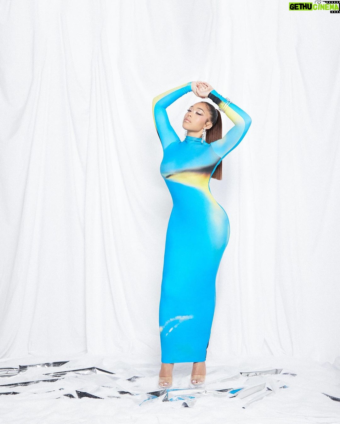 Jordyn Woods Instagram - Introducing the Rayne Dress 🩵 available now @woodsbyjordyn 😊 this fabric melts into your skin but snatches you up! Can’t wait for you to try it❄️
