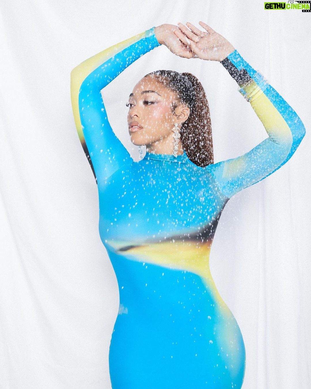 Jordyn Woods Instagram - Introducing the Rayne Dress 🩵 available now @woodsbyjordyn 😊 this fabric melts into your skin but snatches you up! Can’t wait for you to try it❄️