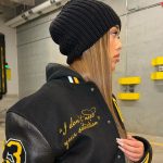 Jordyn Woods Instagram - A sample from the @woodsbyjordyn archive that @karltowns and I collaborated on.. I’m actually obsessed with this letterman.. should we produce this!? Also bringing something other than clothing to @woodsbyjordyn this holiday season.. 😉 ALSO Black Friday sale coming this week, 35% off and a free HAT with purchase over $150🤍