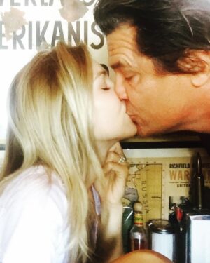 Josh Brolin Instagram - It's in moments like these that move me -- our foreground assaults of any backdrop. It could be us then or us now, the kisses that create us. They are all at once sexy and smart and more stripped down than I've ever known us to be. You're a force who demands the experience of deepening, and I thank my lucky stars that you chose me to want to share all this with. Fierce ain't for everyone. Most people want their cake and their icing left at the back door and they don't want you to knock too loud when you leave it. We are a more feral bunch. You can see it in our little girls, as they already embrace the dirt clod voices that are theirs and not the masquerading whispers of that weakest vocabulary word: etiquette. Kindness and the surety that every voice is unique and beautiful and worthy and has the capacity to sing becomes us. 
We sing. 
And we kiss. 
And I celebrate 
the pirate ship 
that is you. 
Love and foreverly. 
Happy Anniversary. 
❤️❤️❤️❤️❤️❤️❤️ 
@kathrynbrolin