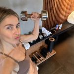 Julianne Hough Instagram – It feels so gooood to be back 💪🏻 

Grab some weights, and let’s do this together – check out my workout routine below!

Squat press – 8 reps each side
Lunge to step up with shoulder press – 8 reps each side
Four square hops with ball drop – 3 rounds
Walking lunges – 10 reps each side 
Sled push 
Pull-ups – as many as you can