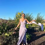 Julianne Hough Instagram - A few of my favorite things… sunflowers and a beautiful @victoriabeckham dress 🌻💜 Sunflowers are some of the most magical flowers I’ve come across, which is why they’re my favorite. They always turn to face the sun and they’re known as a symbol for hope, healing and joy - something I always strive to have in my life and surround myself with. Even named my little one Sunny ☀️🐶