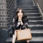 Jung Chae-yeon Instagram - @prada 🤎 #PradaBuckle # #adv