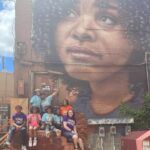 Jussie Smollett Instagram - Slipped into Flint today to show love and support to my Angel #MariCopeny aka @littlemissflint , Peanut and Mama Lulu on their annual Back to School Bash. Once again, I had the best time and was in complete awe of what they’ve accomplished. They gave away 1,000 backpacks with all the supplies, 200 uniform shirts, 125 uniform bottoms, over 150 packs of socks and underwear, 30 pairs of sneakers, personal care items, books, hair bows and supplies, a game truck, and a ton of fresh produce. I love y’all so much. So proud of all you do. #TeamMari for life… #FlintStrong Flint, Michigan
