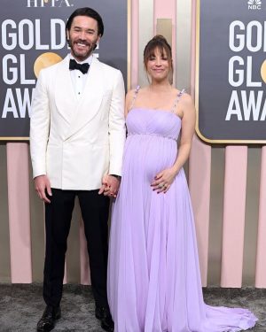 Kaley Cuoco Instagram - 💜the 3 of us making our @goldenglobes red carpet debut together!💜pure joy all around🥹 unbelievable team once again! @bradgoreski @daniela_viviana @jamiemakeup @christinesymondshair @lubastailoring ( thank you @verawanggang for the most delicious sherbet gown! A moment I will cherish! @priyadeluxe ) @rahaminovdiamonds @normansilverman @charleskeithofficial @jimmychoo 🤍my gorgeous other half @tommypelphrey wearing @isaia 🤍