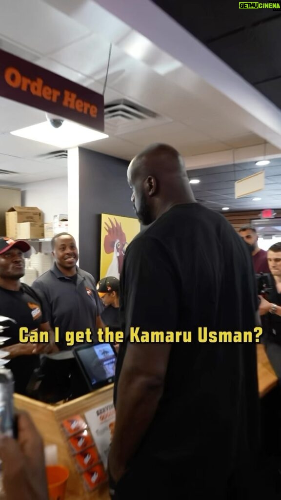 Kamaru Usman Instagram - Some times you need to get behind the counter and run things 😁🫶🏿 Thank you @shaq and @bigchickenshaq for having me 🙏🏿