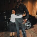 Kamaru Usman Instagram - What an amazing night I get to share with my little lady. I hope one day she will help me remember some of these amazing moments 😍🤗🥰🫶🏿 #misspretty 📸 @patty_cuts Styled: @ugomozie @culturedbyugo Miami, Florida