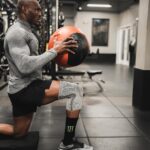 Kamaru Usman Instagram - 8+ years and we still working @drcpeacock 🤜🏿🤛🏻 #More2come