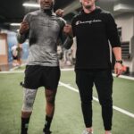 Kamaru Usman Instagram - 8+ years and we still working @drcpeacock 🤜🏿🤛🏻 #More2come