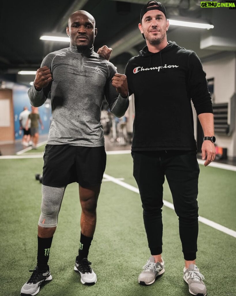 Kamaru Usman Instagram - 8+ years and we still working @drcpeacock 🤜🏿🤛🏻 #More2come