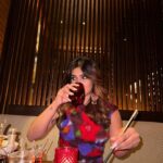 Karishma Sharma Instagram - The lady in red. ✨❤️ “Basking in the serene glow of the first full moon, I find my Zen zone, radiating happiness. 🌕 Reflecting on the delicious flavors of China by @grandhyattmumbai the stir-fried chicken paired with edamame created a healthy and delightful feast. Excited to explore more, the duck preparation awaits my eager taste buds. Cheers to manifesting positivity and savoring life’s delectable moments! 🍜❤️🤌🏼