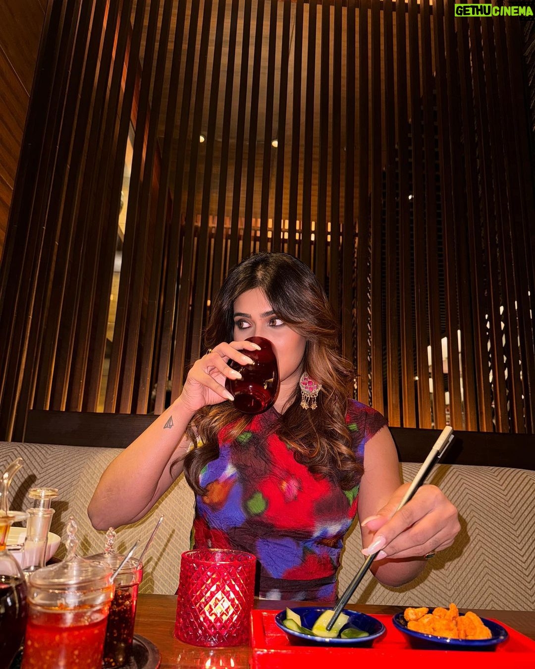 Karishma Sharma Instagram - The lady in red. ✨❤️ “Basking in the serene glow of the first full moon, I find my Zen zone, radiating happiness. 🌕 Reflecting on the delicious flavors of China by @grandhyattmumbai the stir-fried chicken paired with edamame created a healthy and delightful feast. Excited to explore more, the duck preparation awaits my eager taste buds. Cheers to manifesting positivity and savoring life’s delectable moments! 🍜❤️🤌🏼
