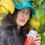 Kat Dennings Instagram - 🚨@DRINKSPINDRIFT HAS A NEW FLAVOR🚨 It is the deliciously tantalizing Blood Orange Tangerine and it’s CRUCIAL to sip it under a tree while the warlock of lemons watches you in fury. The flavor, much like my chosen picnic location, is #anythingbutordinary 🍊#spindrift #spindriftpartner